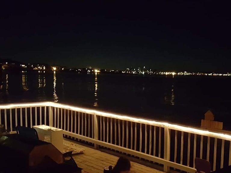 a view of balcony with furniture