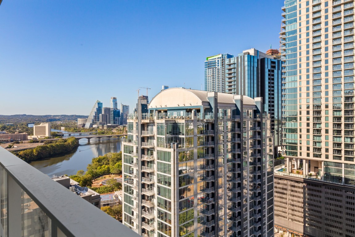 a view of a balcony with city view