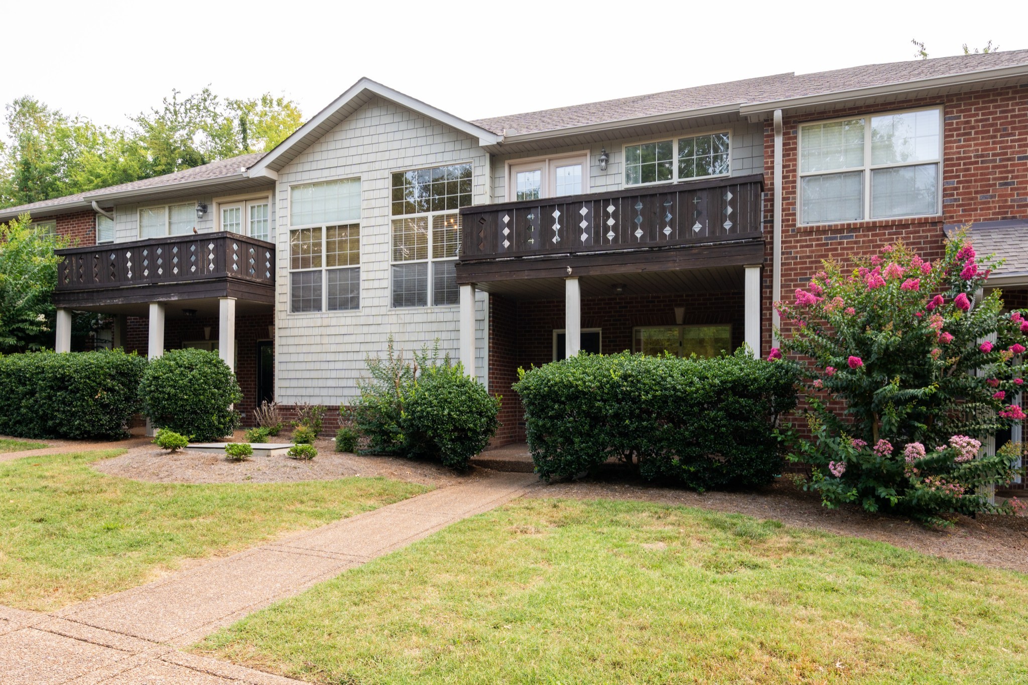 a house view with a garden space