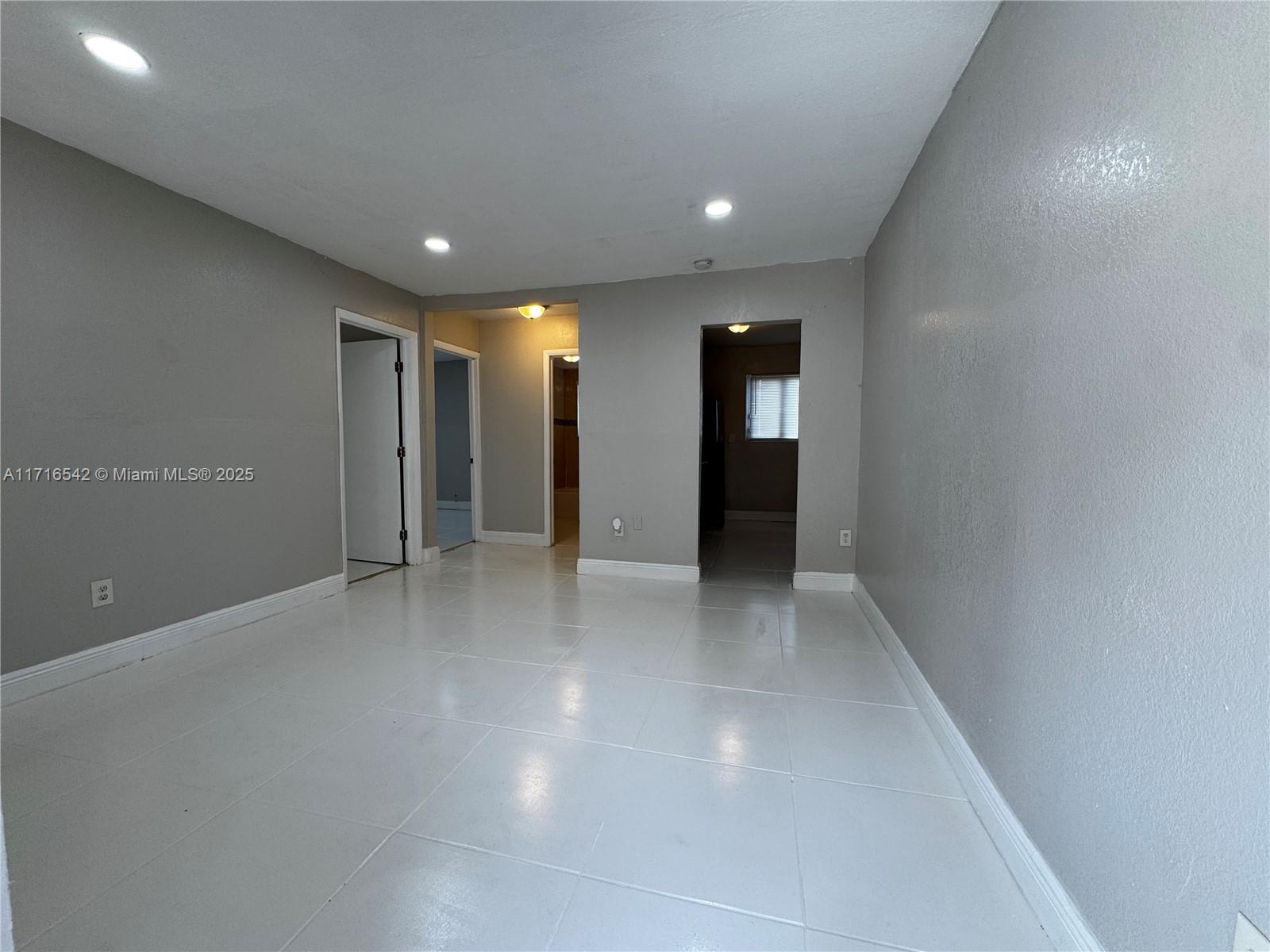 a view of hallway with a window