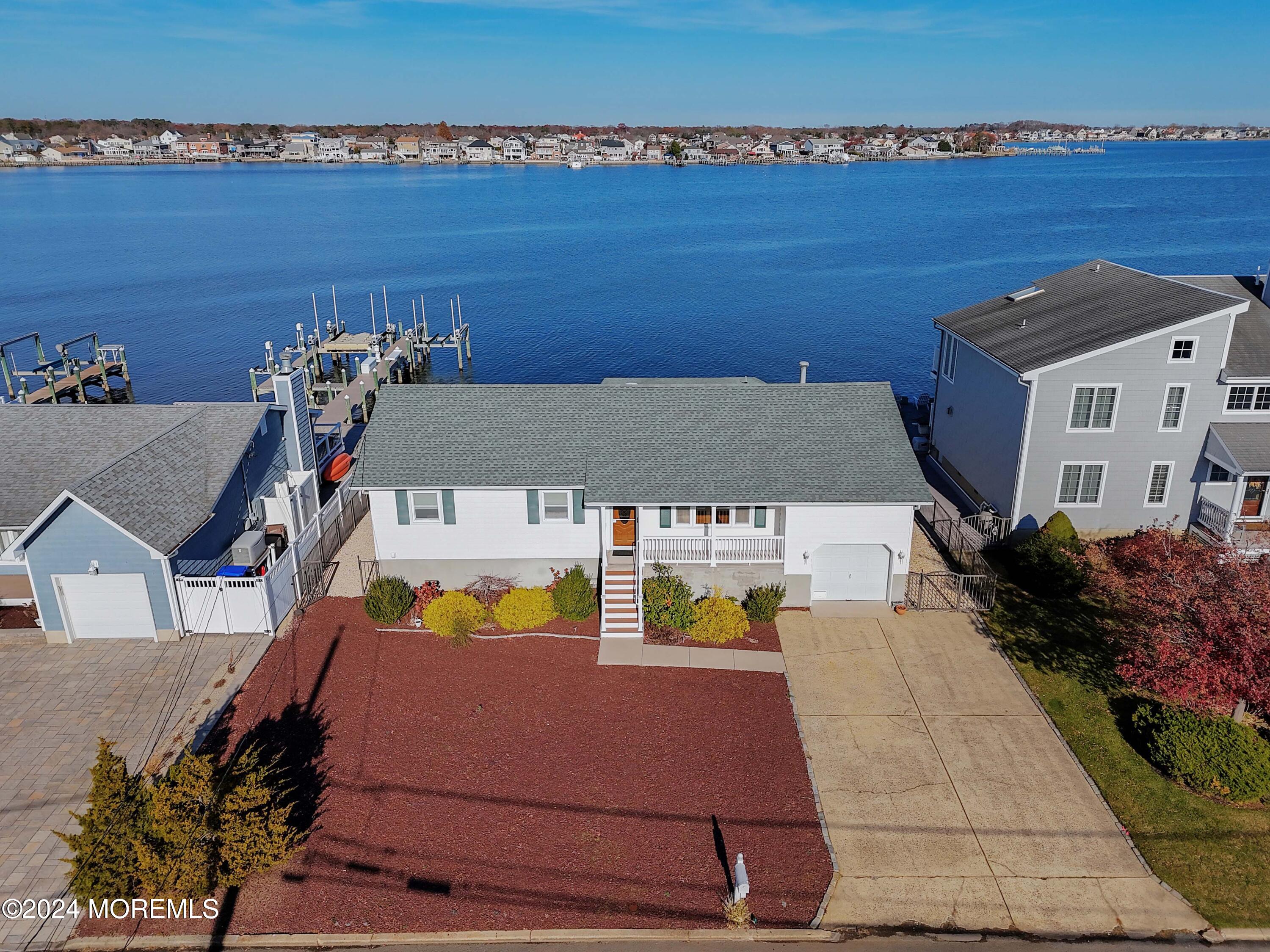 an aerial view of a house with swimming pool