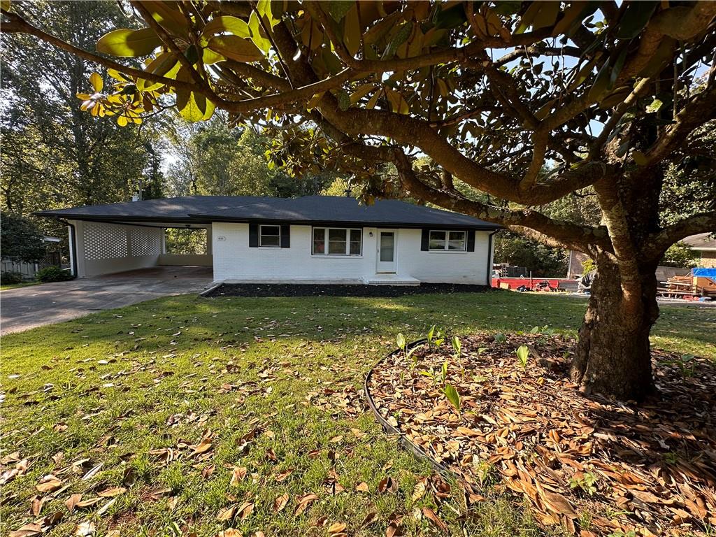 front view of a house with a small yard