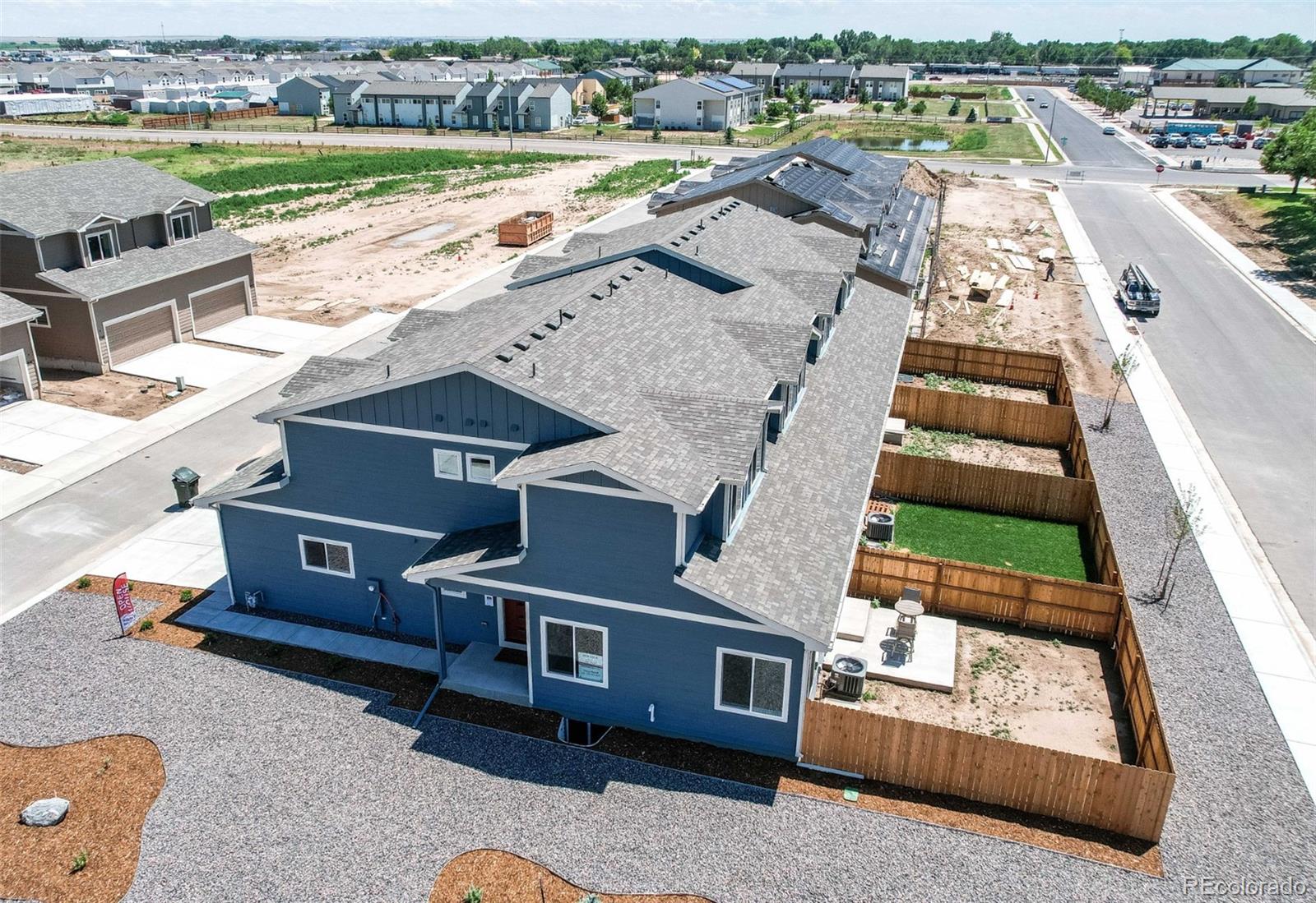 an aerial view of a house with a ocean view