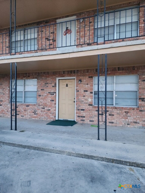 a front view of a house with a garage