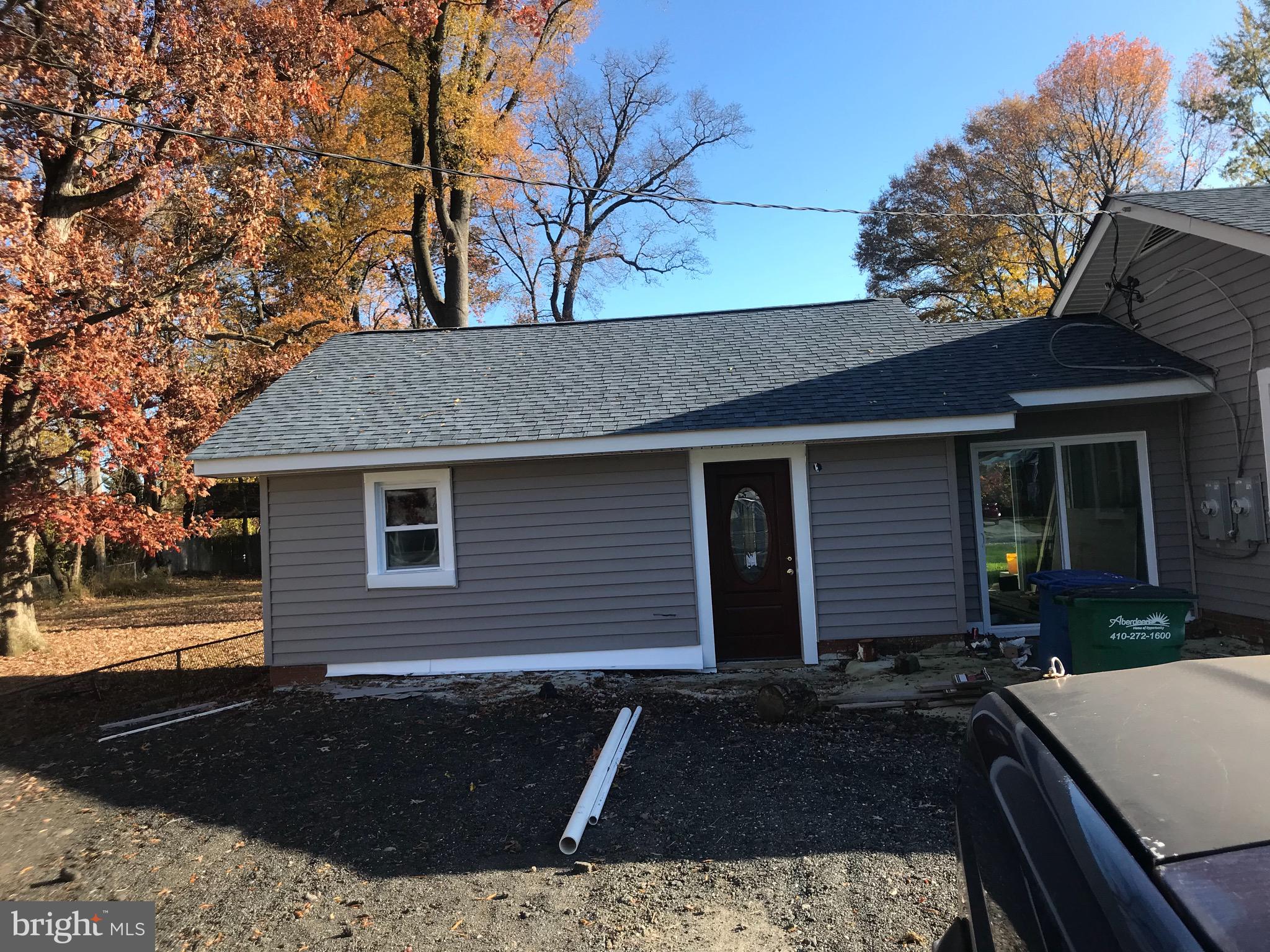 a front view of a house with yard