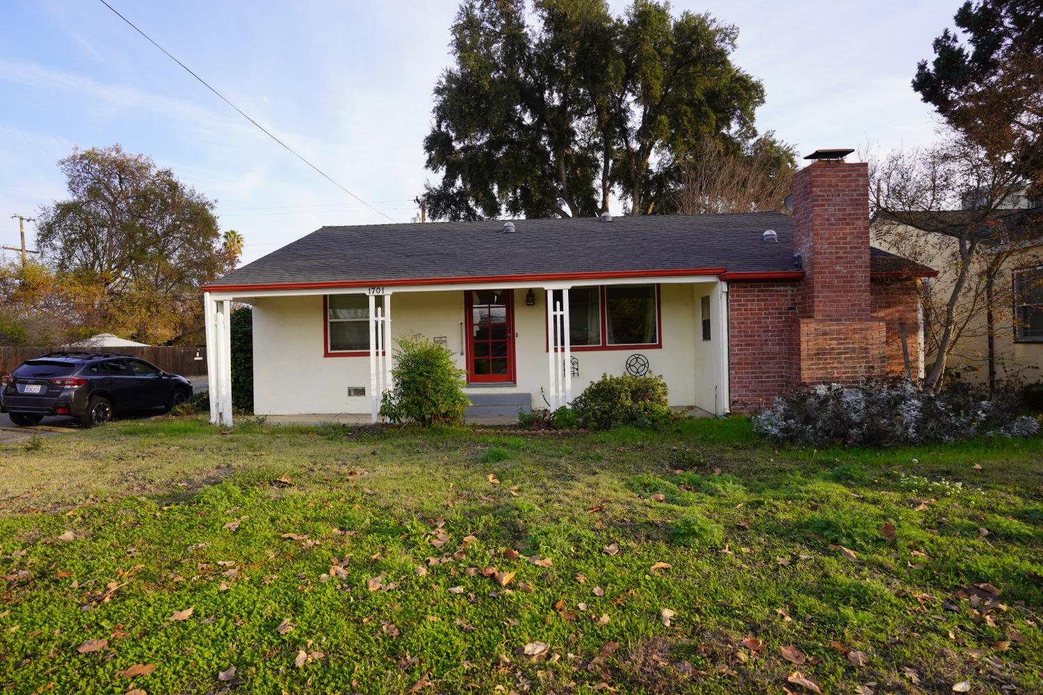 a house view with a garden space