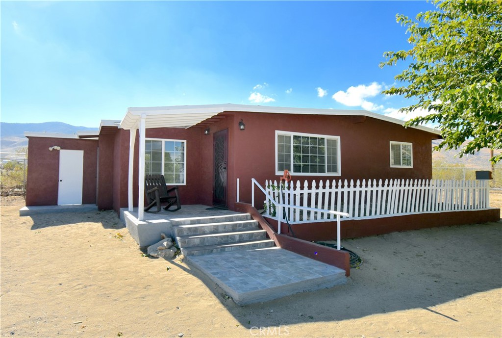 a view of a house with a patio