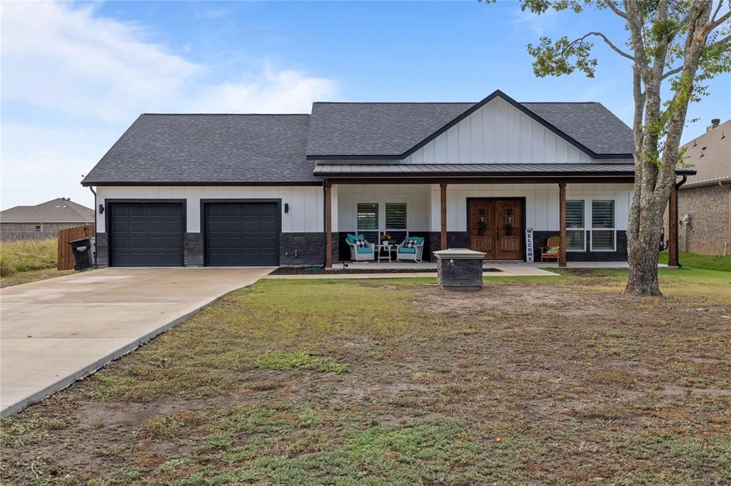 a front view of a house with patio