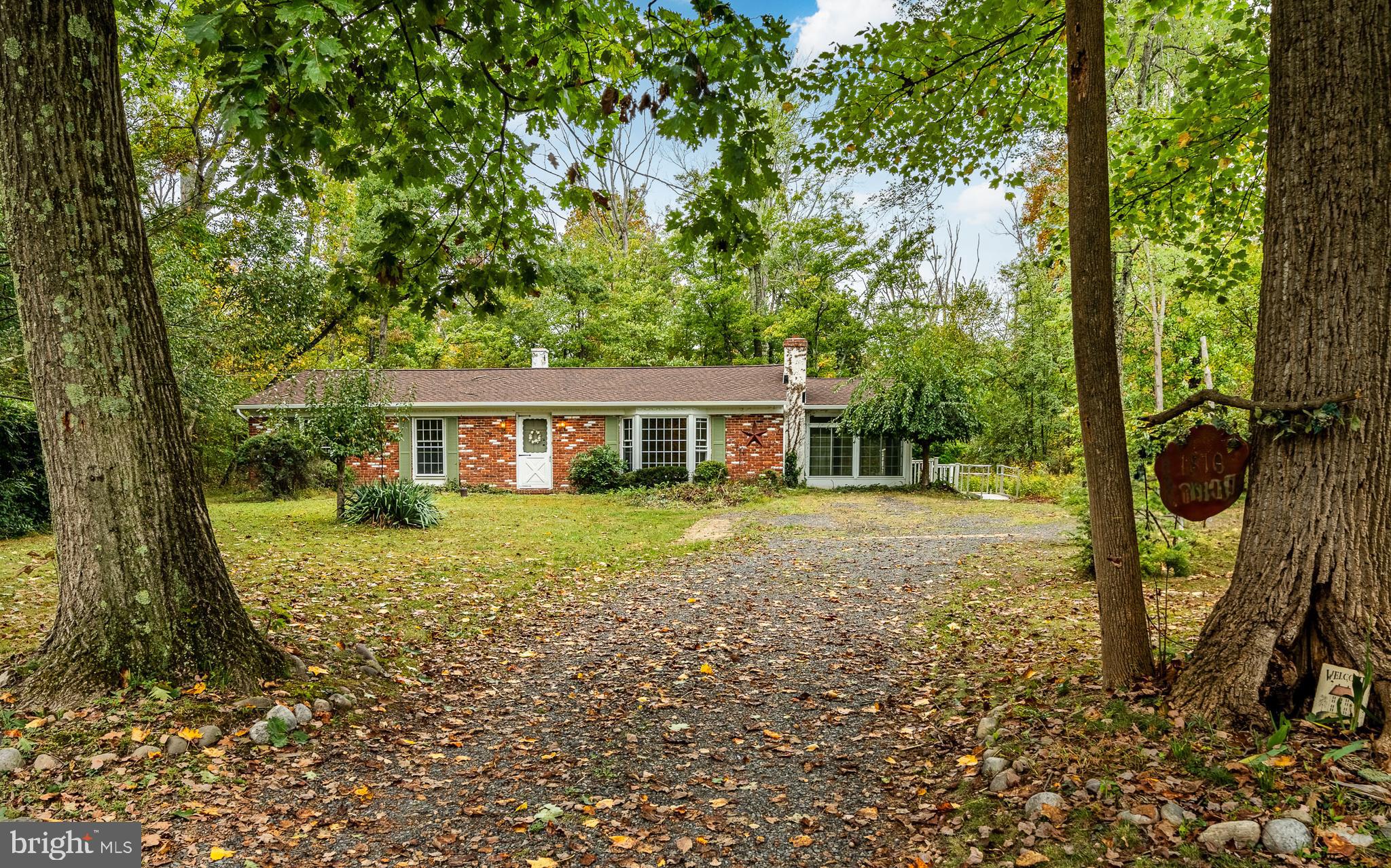 Front of house from end of the driveway