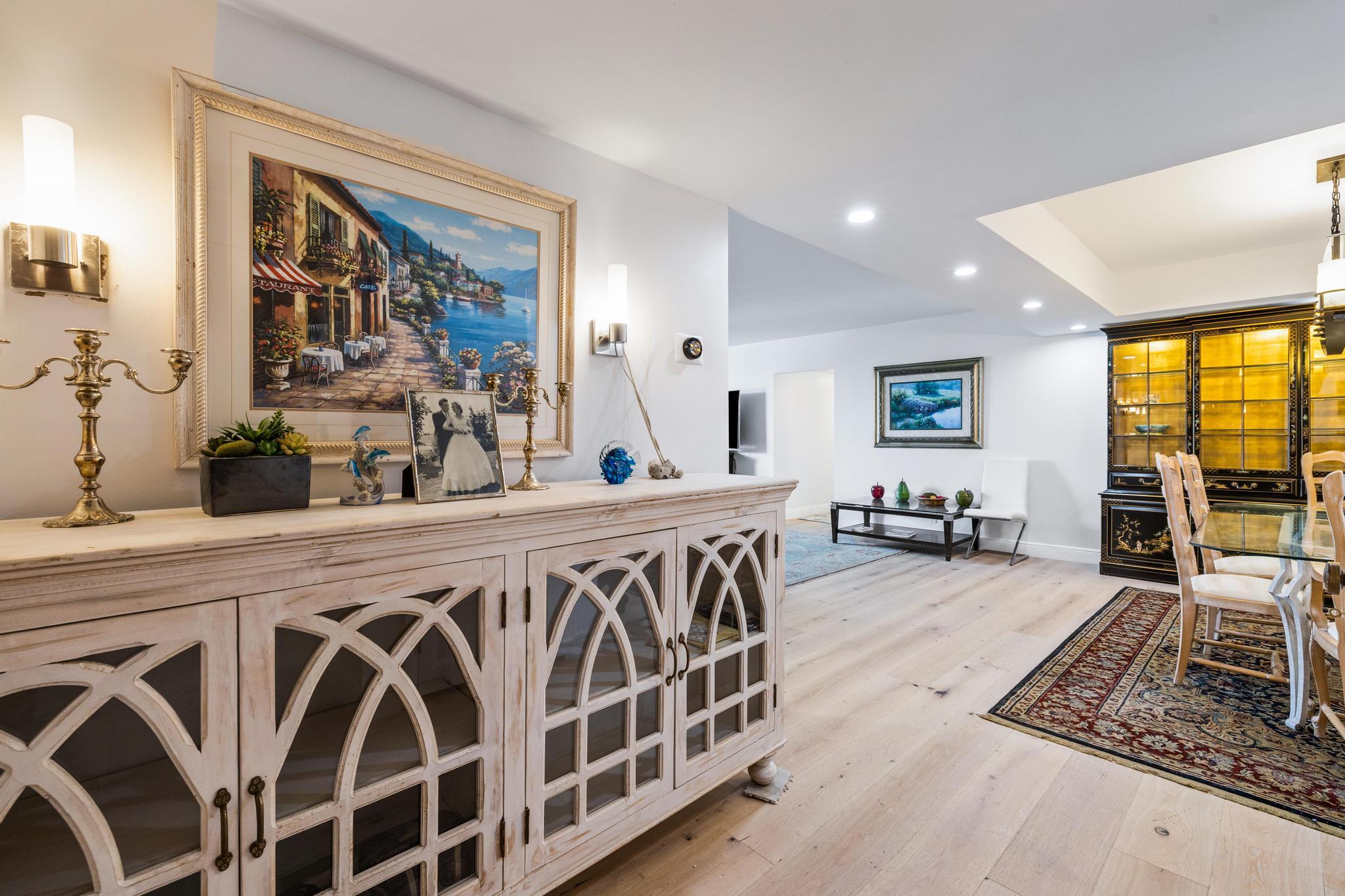 a kitchen with stainless steel appliances granite countertop a stove a sink and a granite counter tops