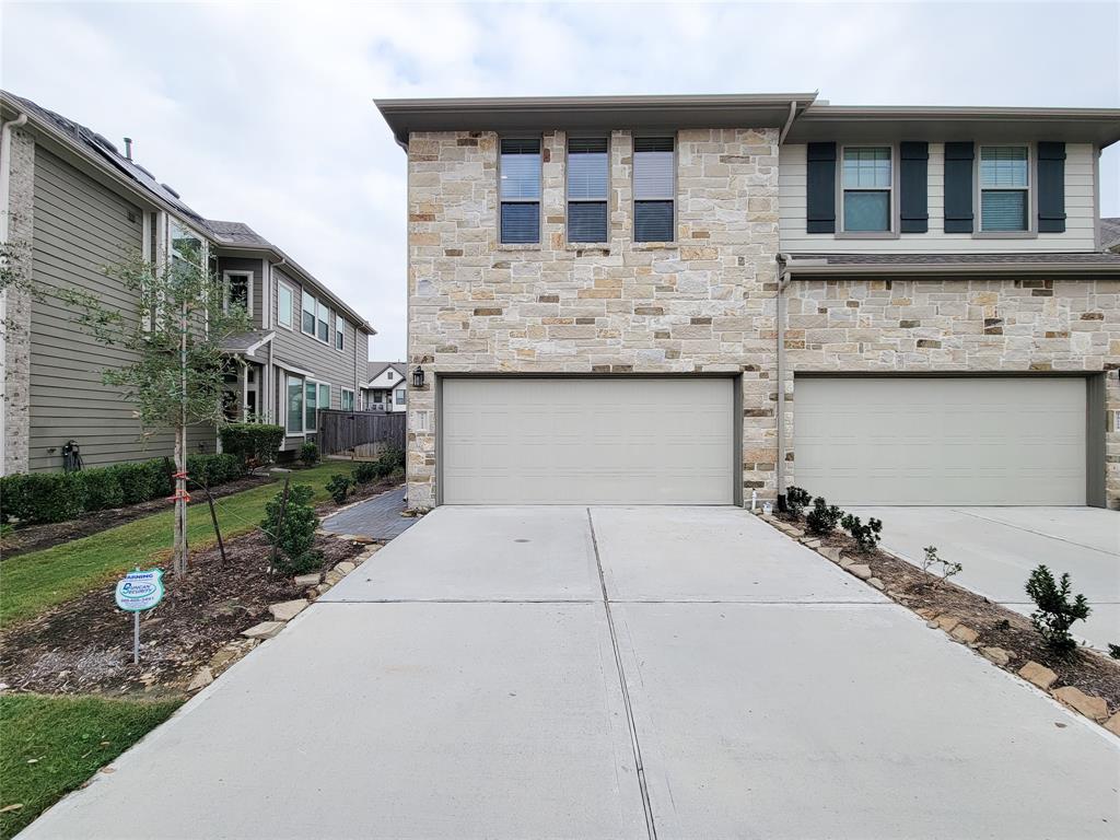 a house view with a garden space