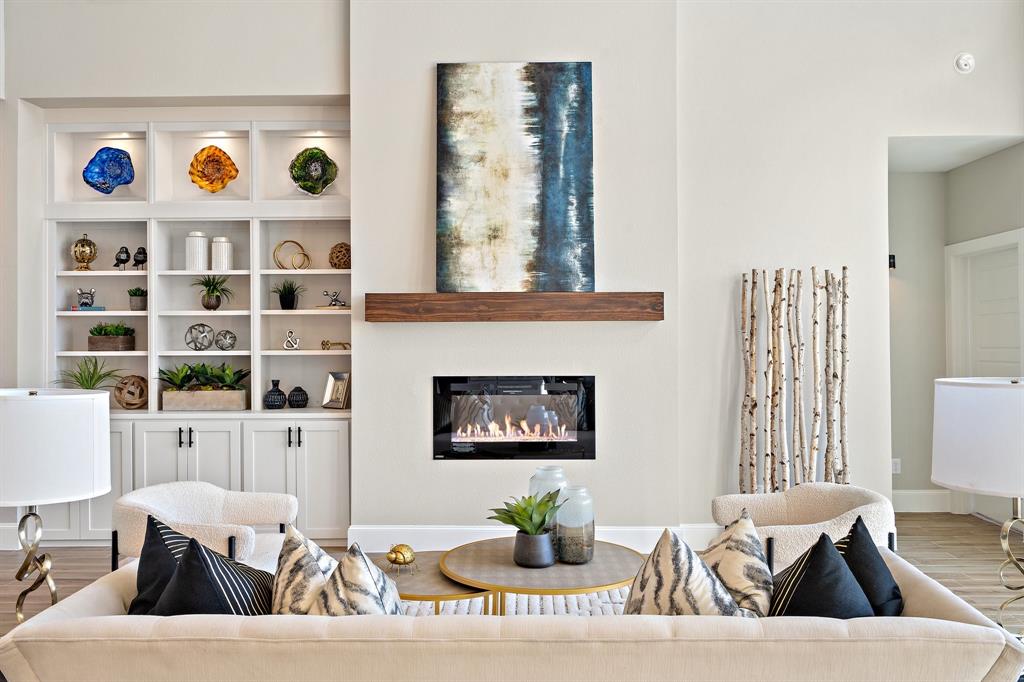 a living room with furniture and window