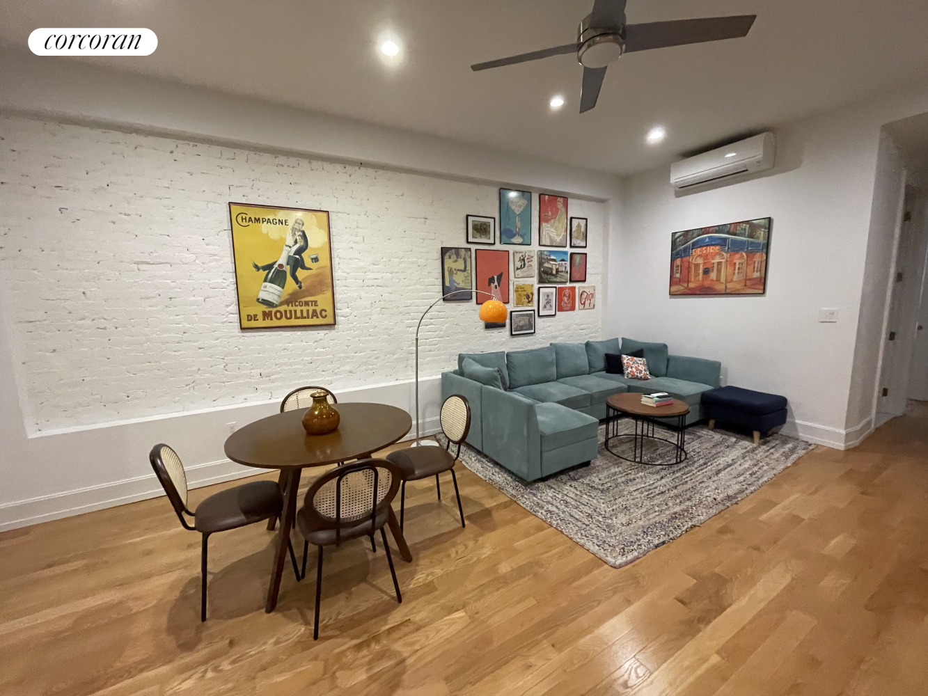 a living room with furniture and a rug