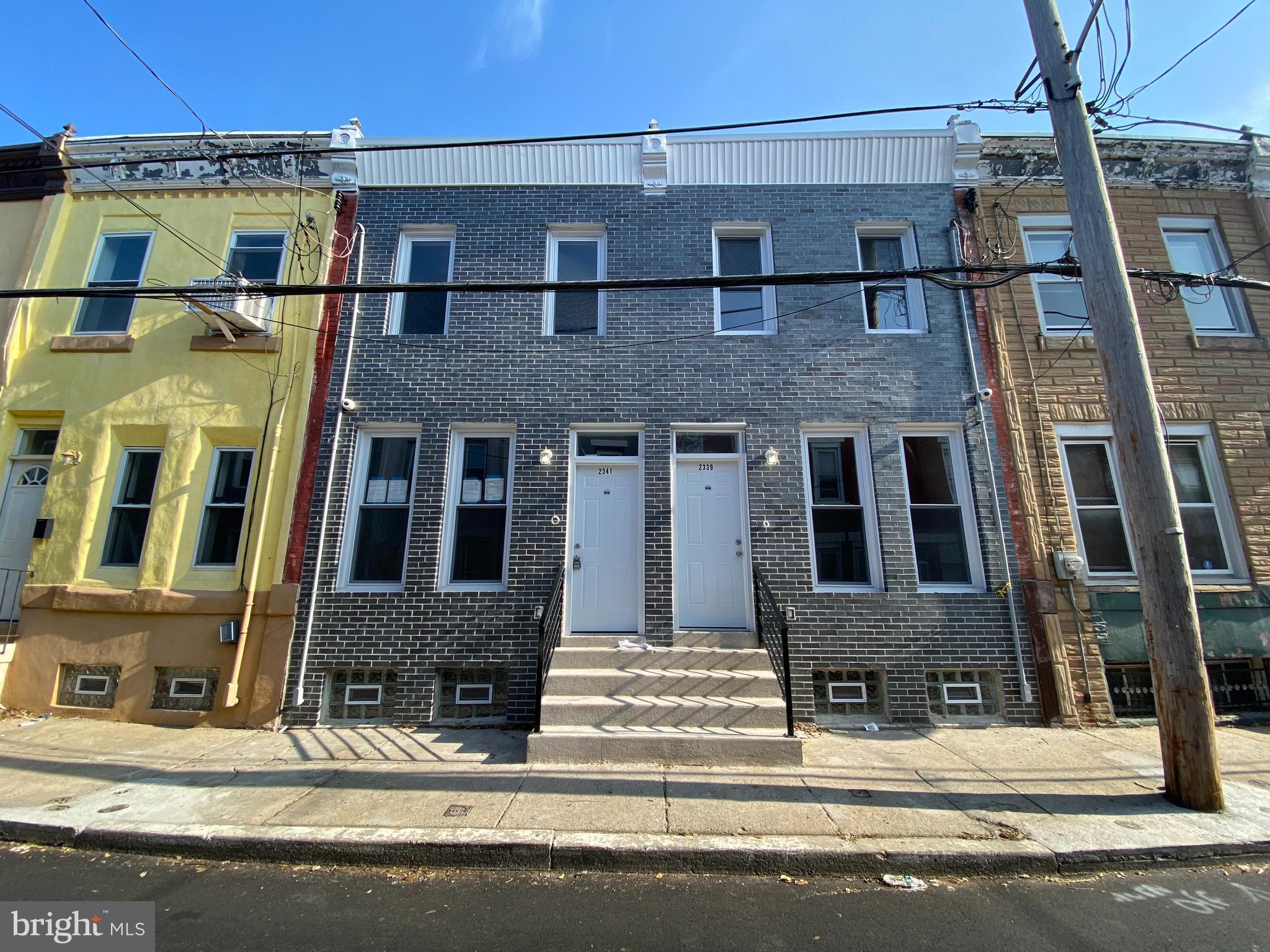 a view of a building with a street