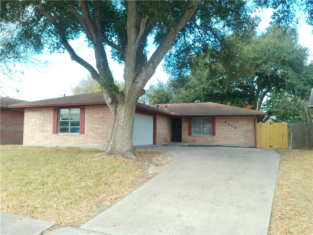 front view of a house with a trees