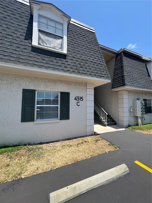 a front view of a house with a garage