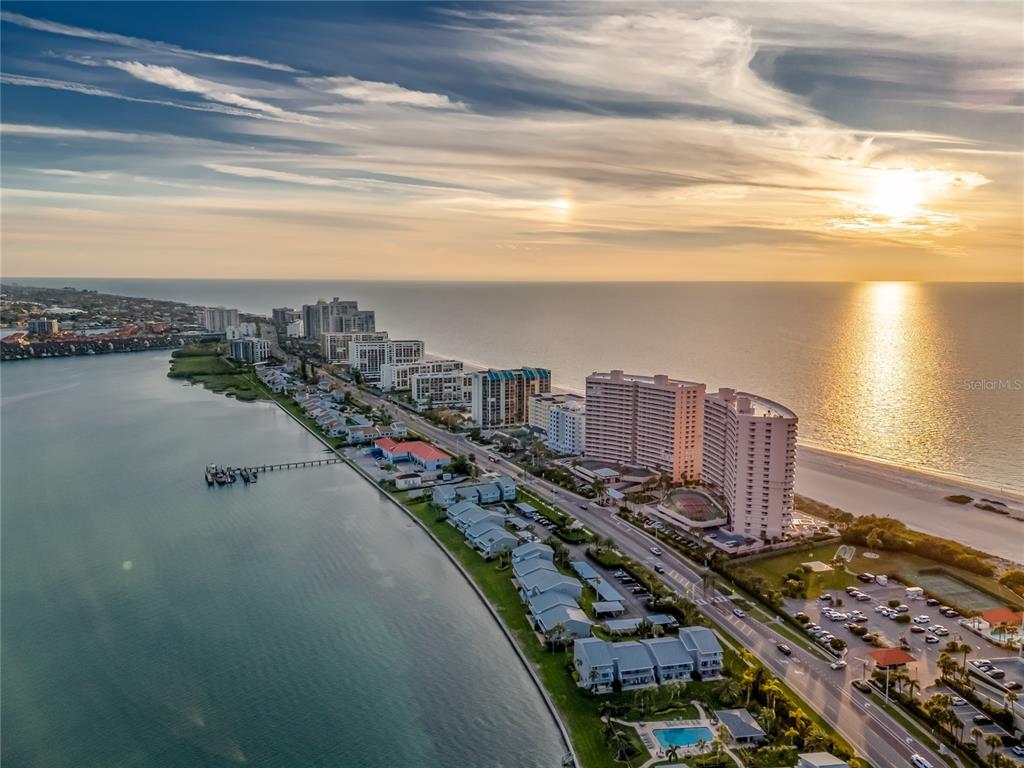 a view of a city and ocean