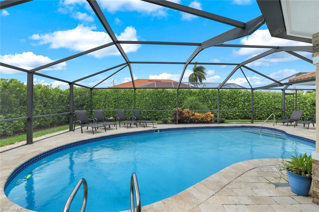 a view of a swimming pool with a porch