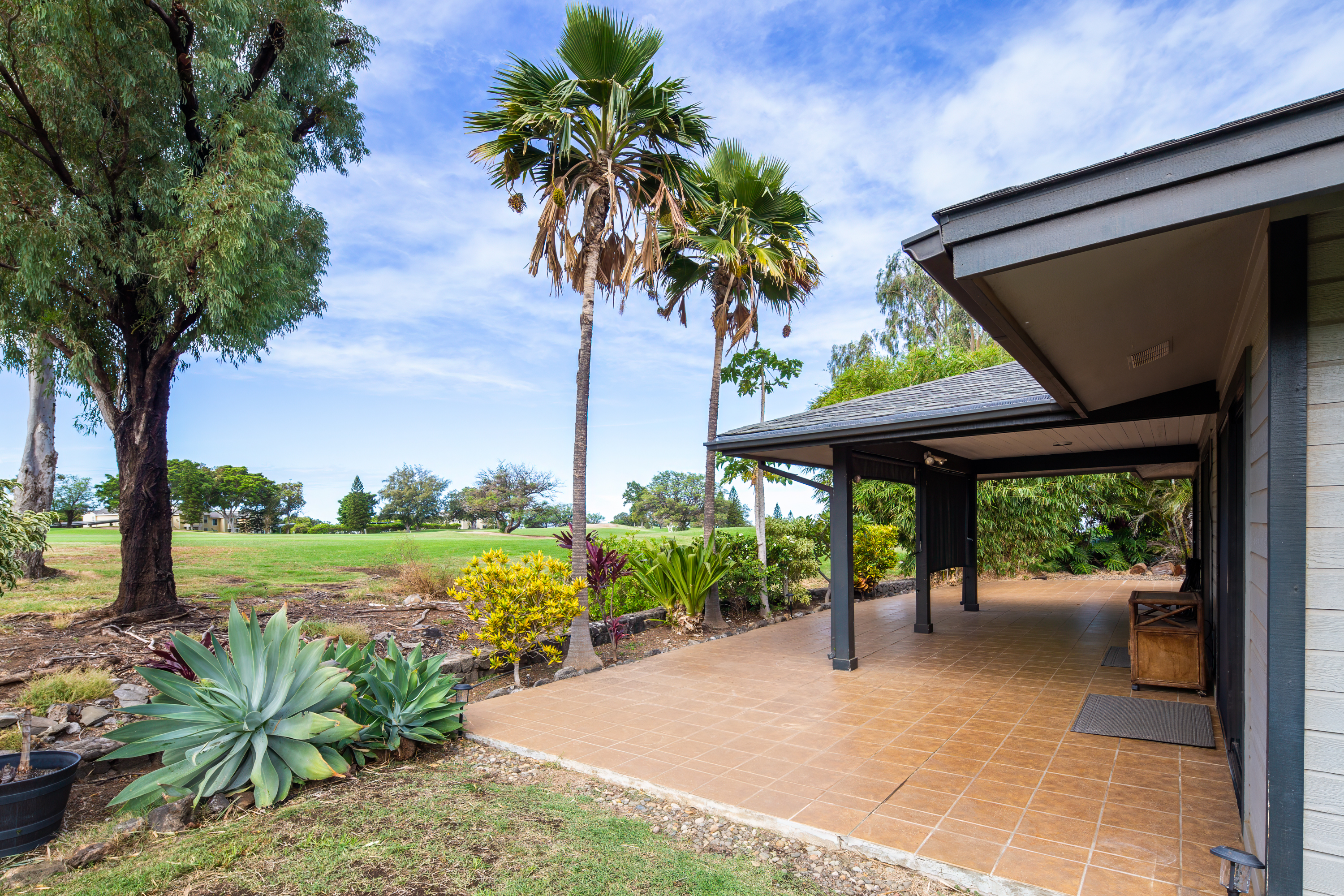 a house view with a garden space