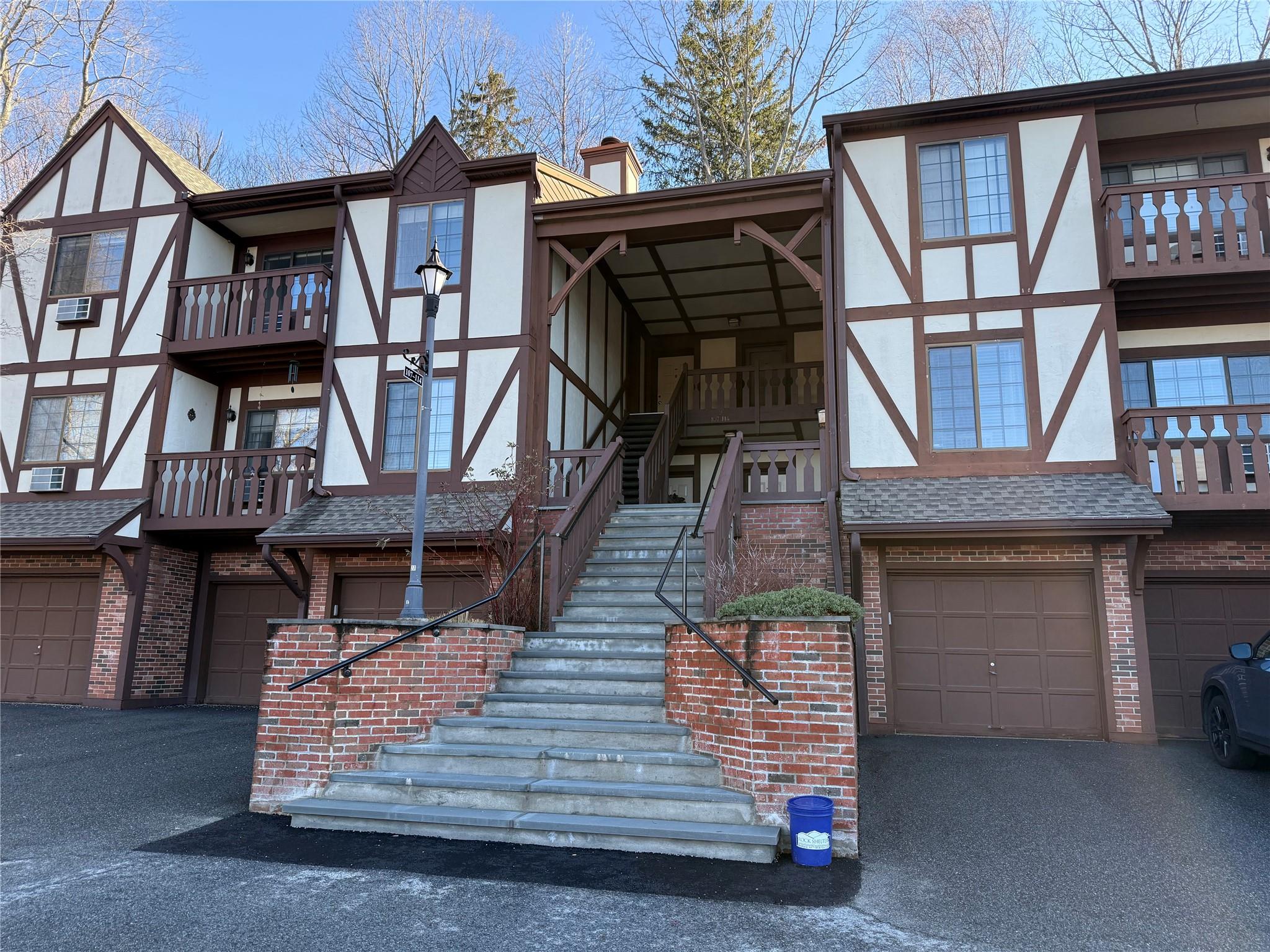 front view of a house with large windows