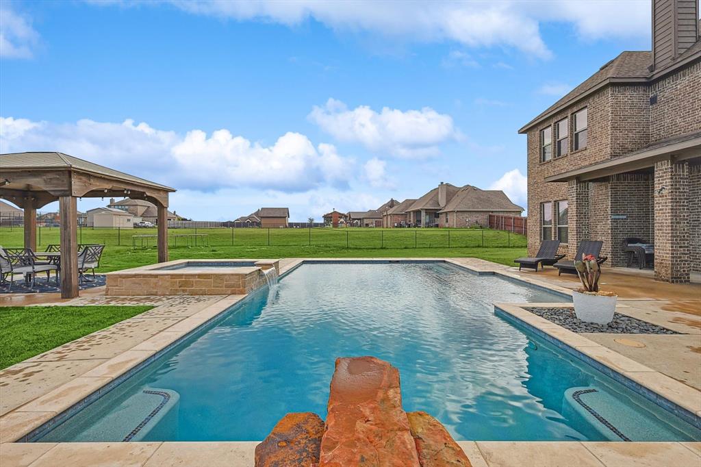 a view of a swimming pool and a terrace