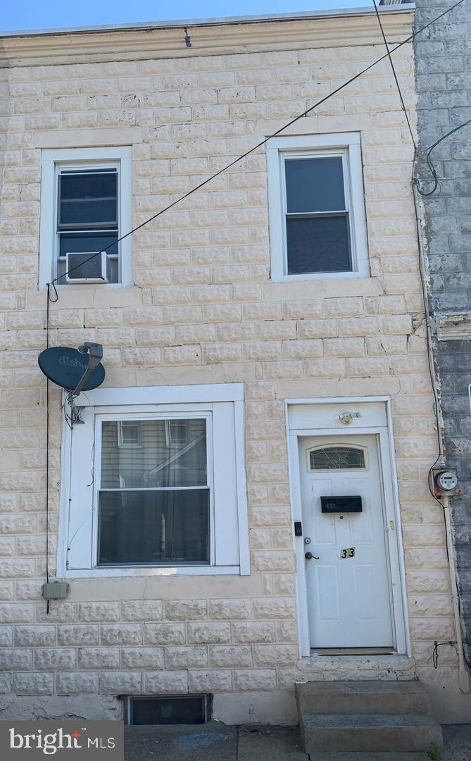 a front view of a house with windows