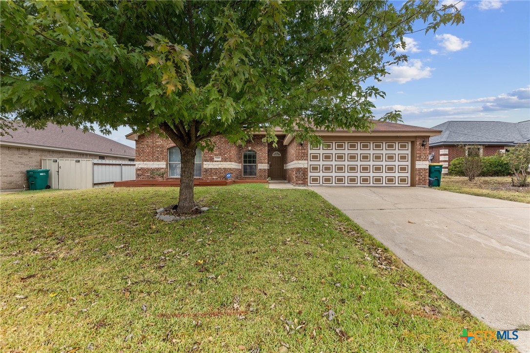 front view of a house with a big yard