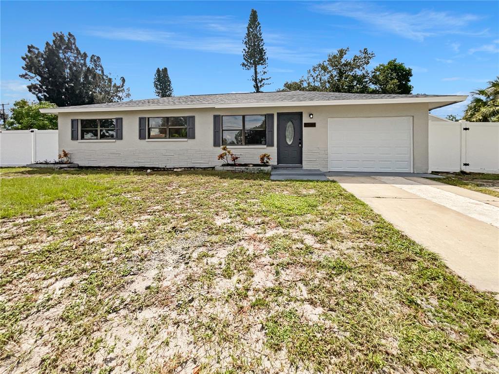 front view of a house with a yard