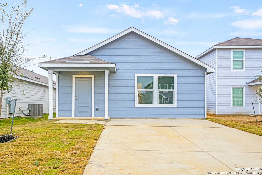 a front view of a house having yard