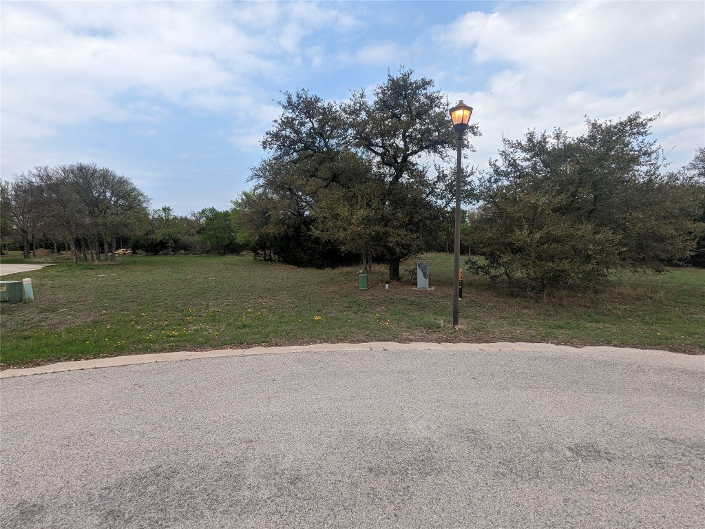 a view of a lake with a big yard