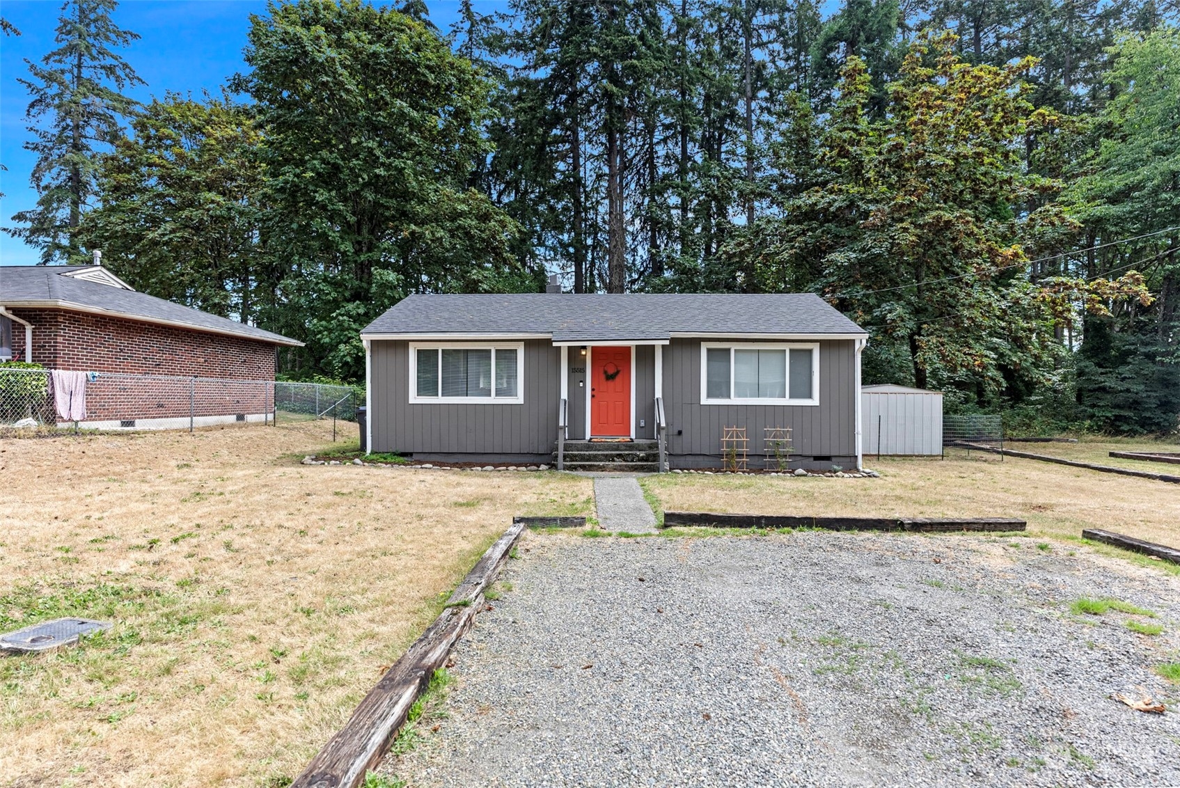 front view of a house with a yard