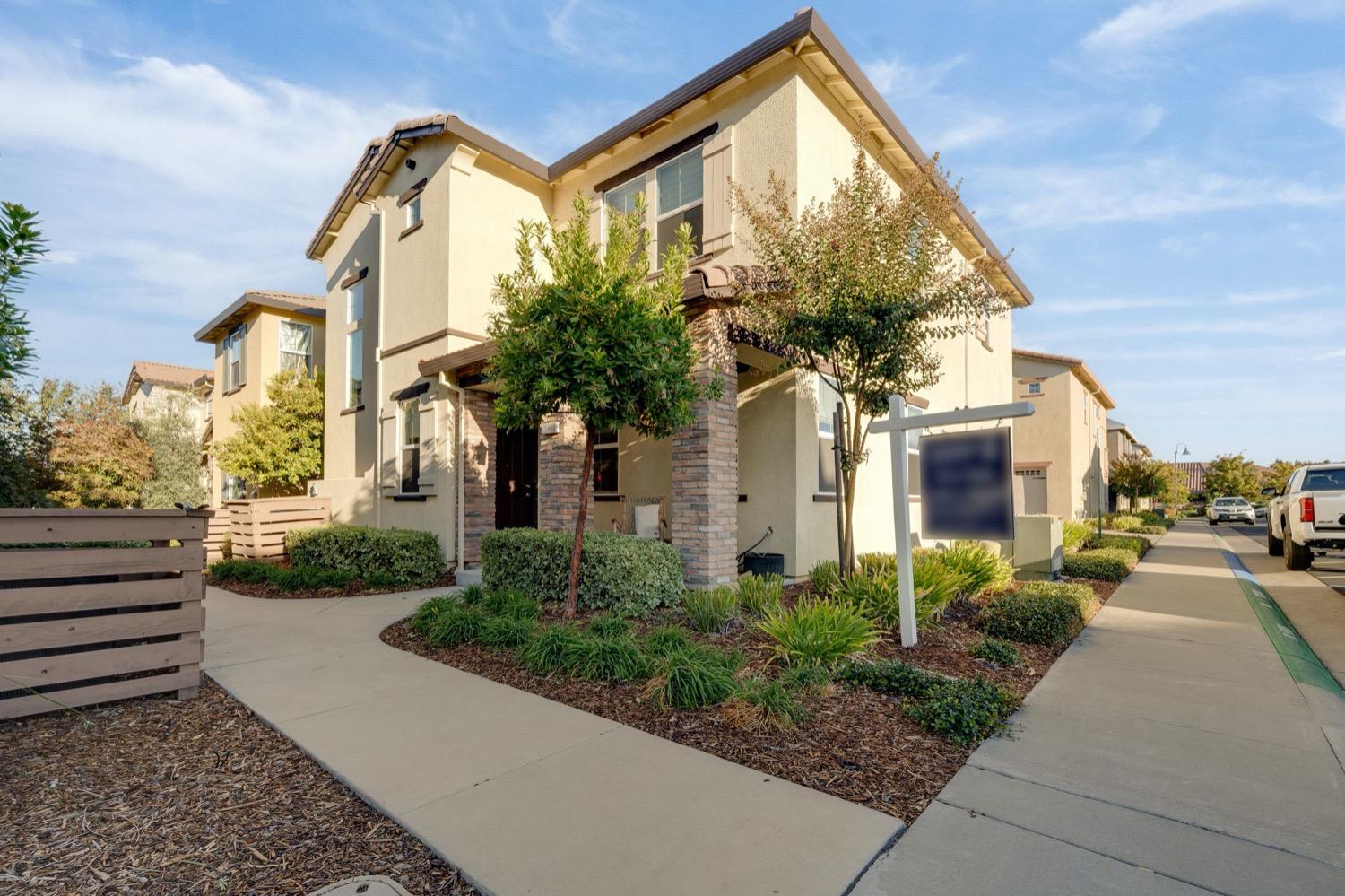 a front view of a house having yard