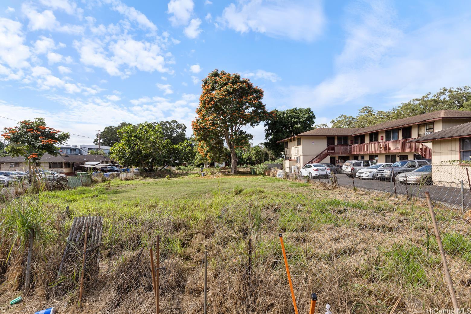 a view of a house with a big yard