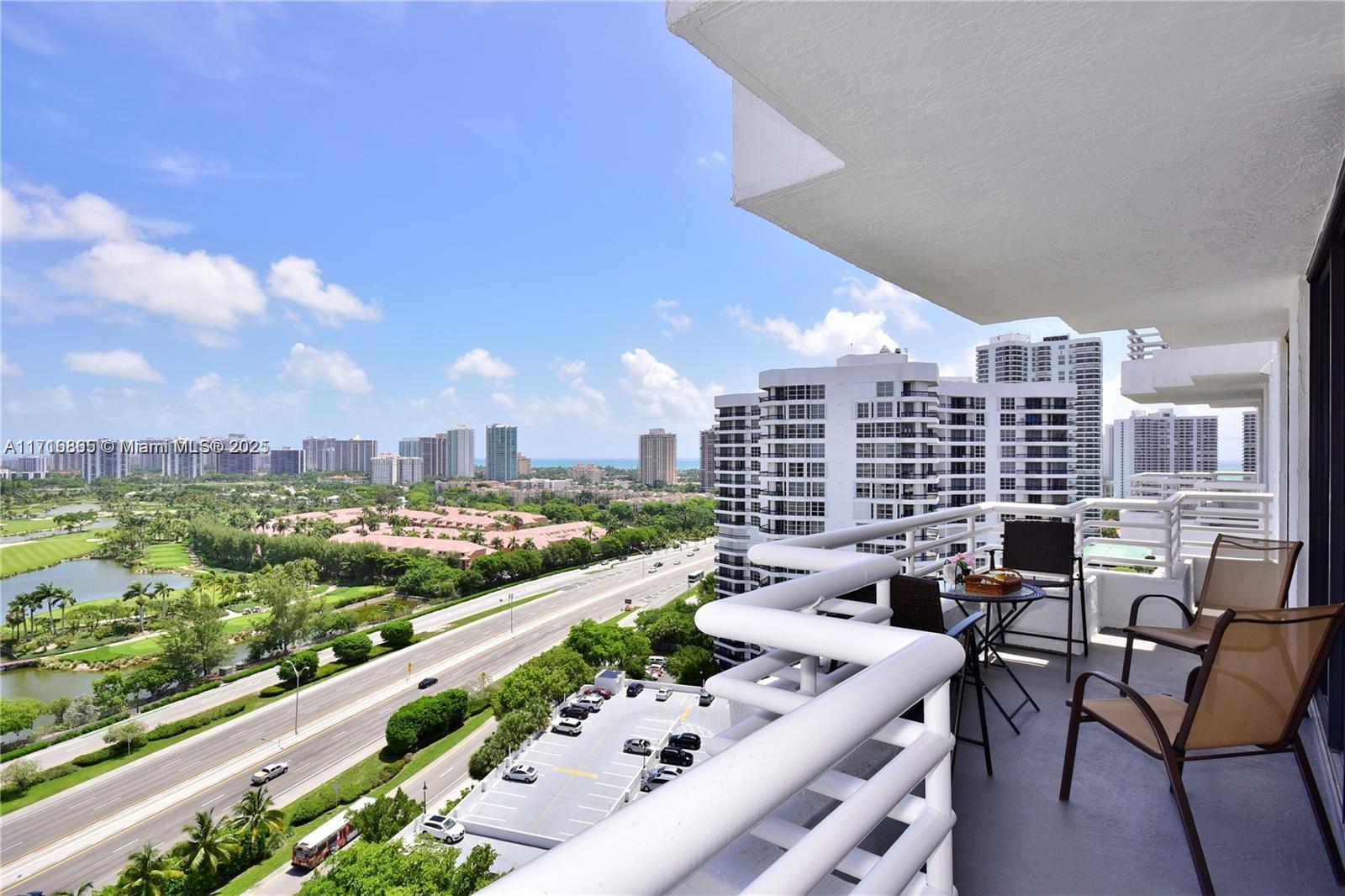 a view of a terrace with furniture