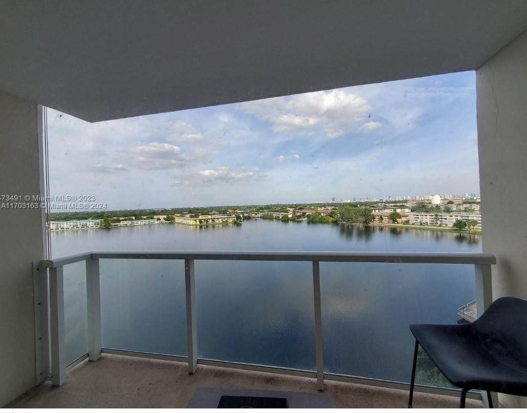 a view of a lake from a balcony