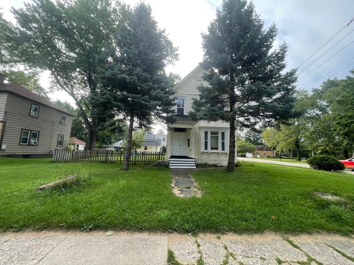 a fire hydrant in the middle of a park