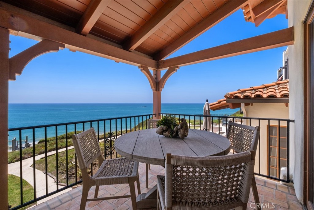 a view of balcony with furniture