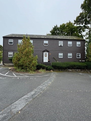 front view of a house with a street