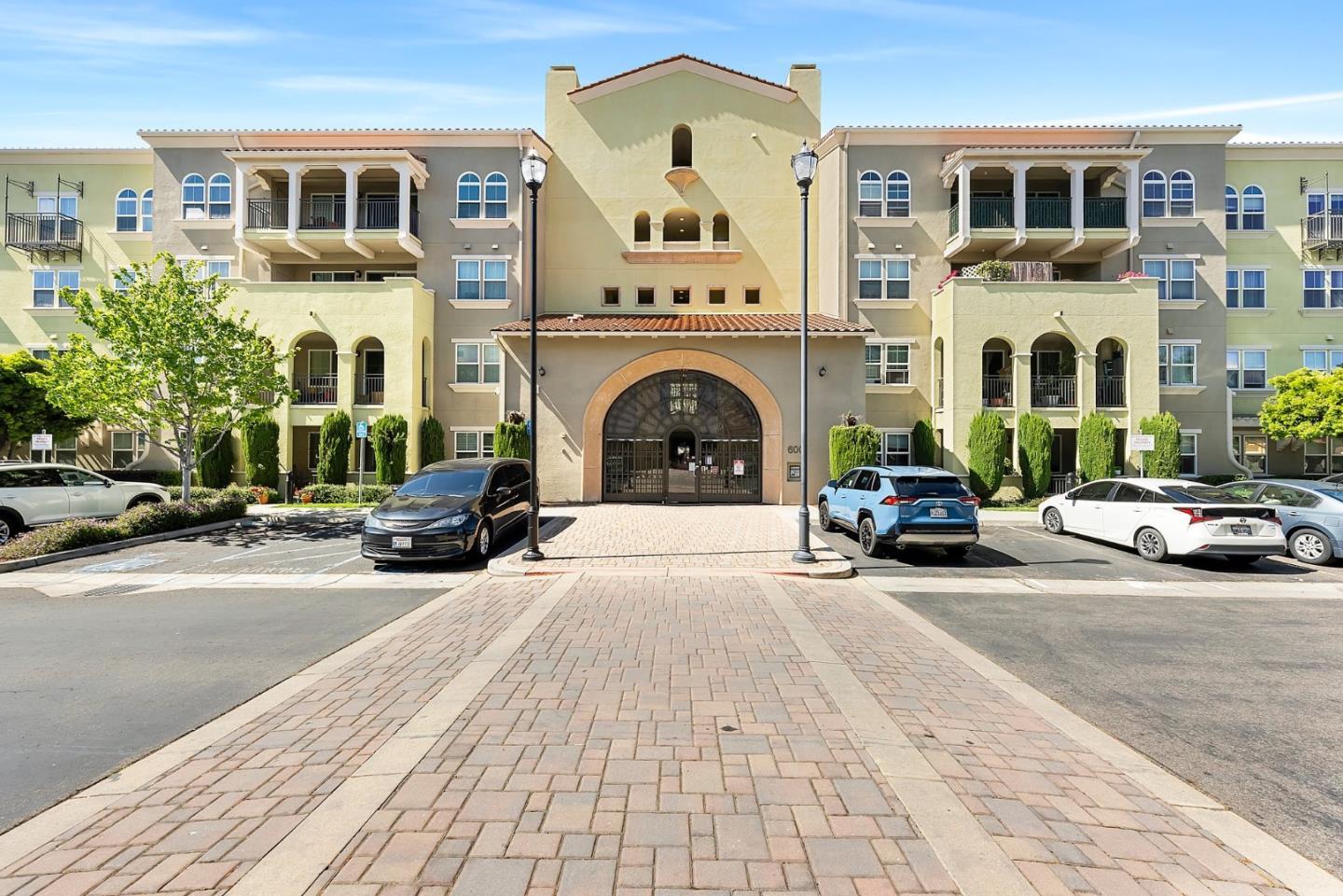 a view of a car parked in front of a building