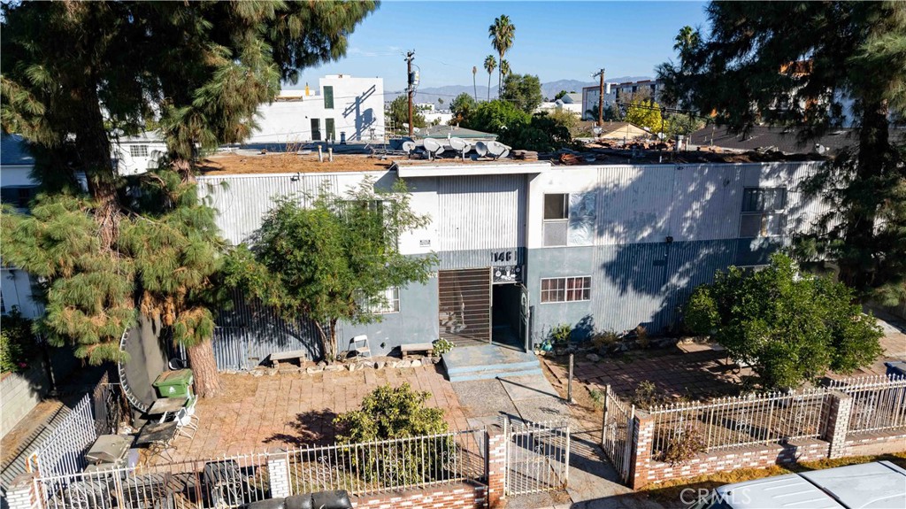 a view of house with outdoor space and sitting space