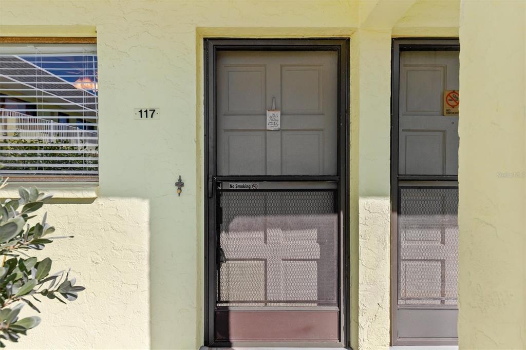 Front door of your new unit6703 Midnight Pass Rd #117, Siesta Key, FL 34242