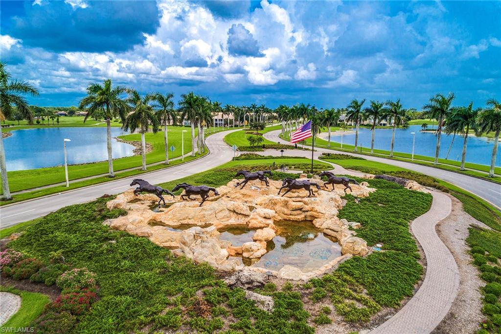 a view of a lake with a big yard