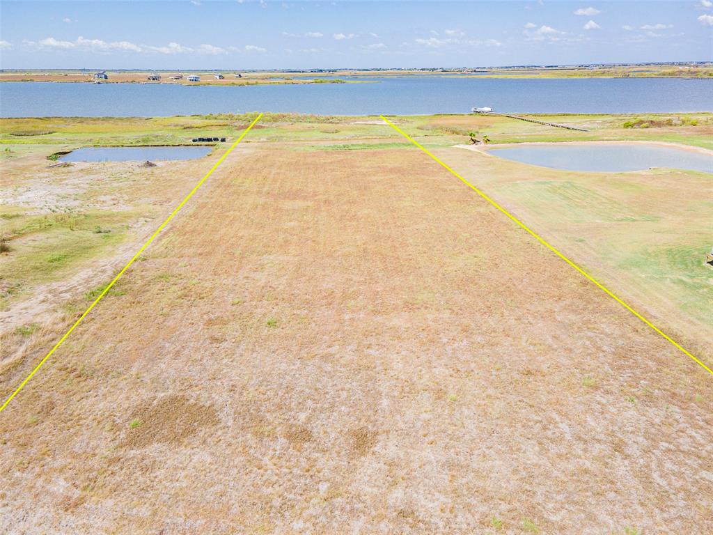 a view of an empty room and beach