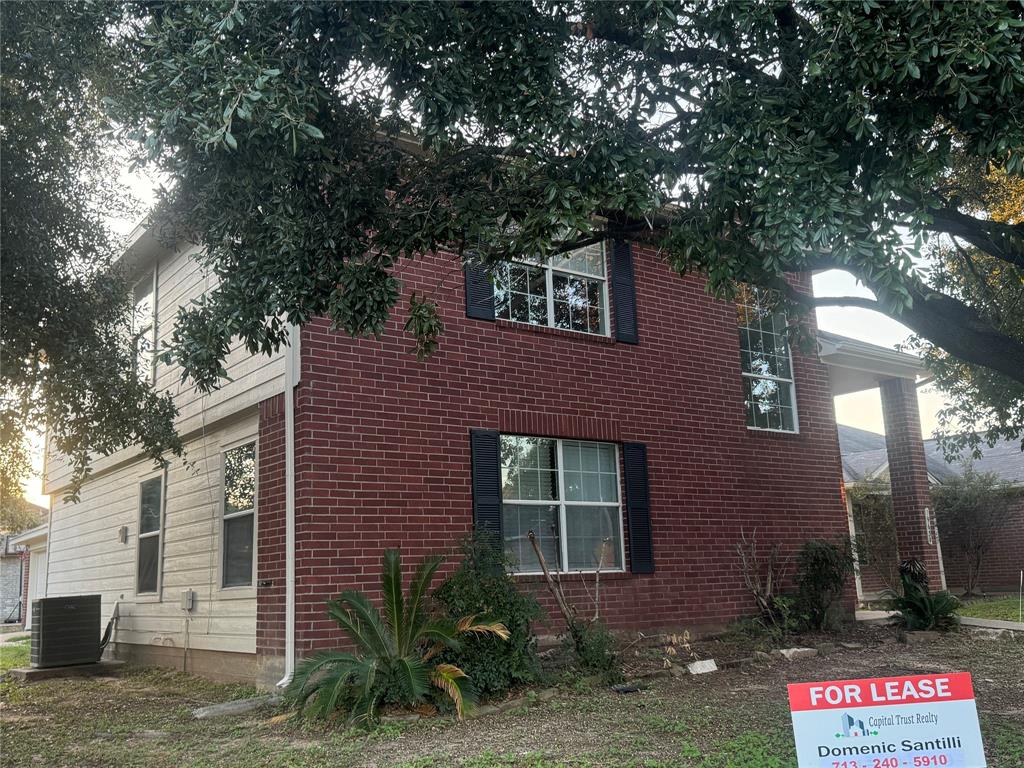 a front view of a house with yard