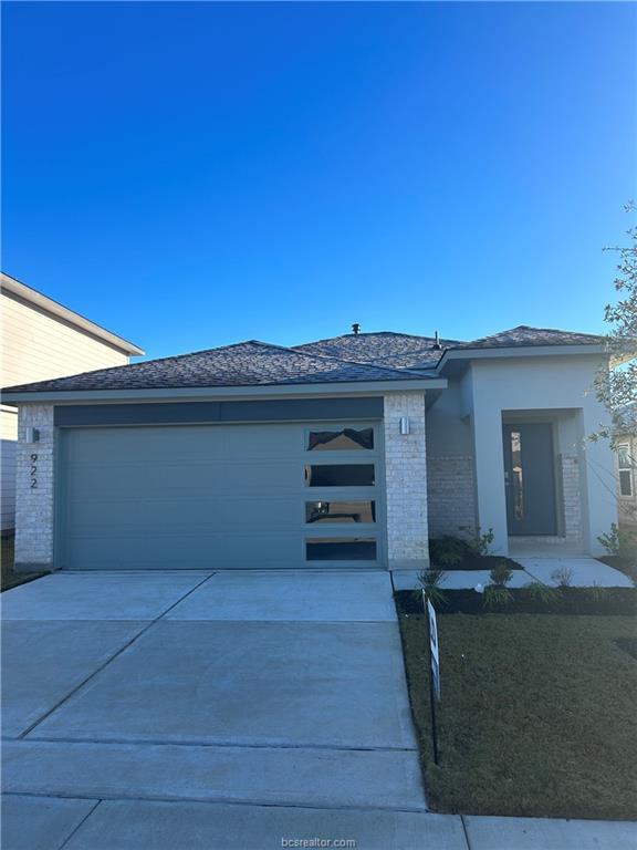 a view of a house with a garage