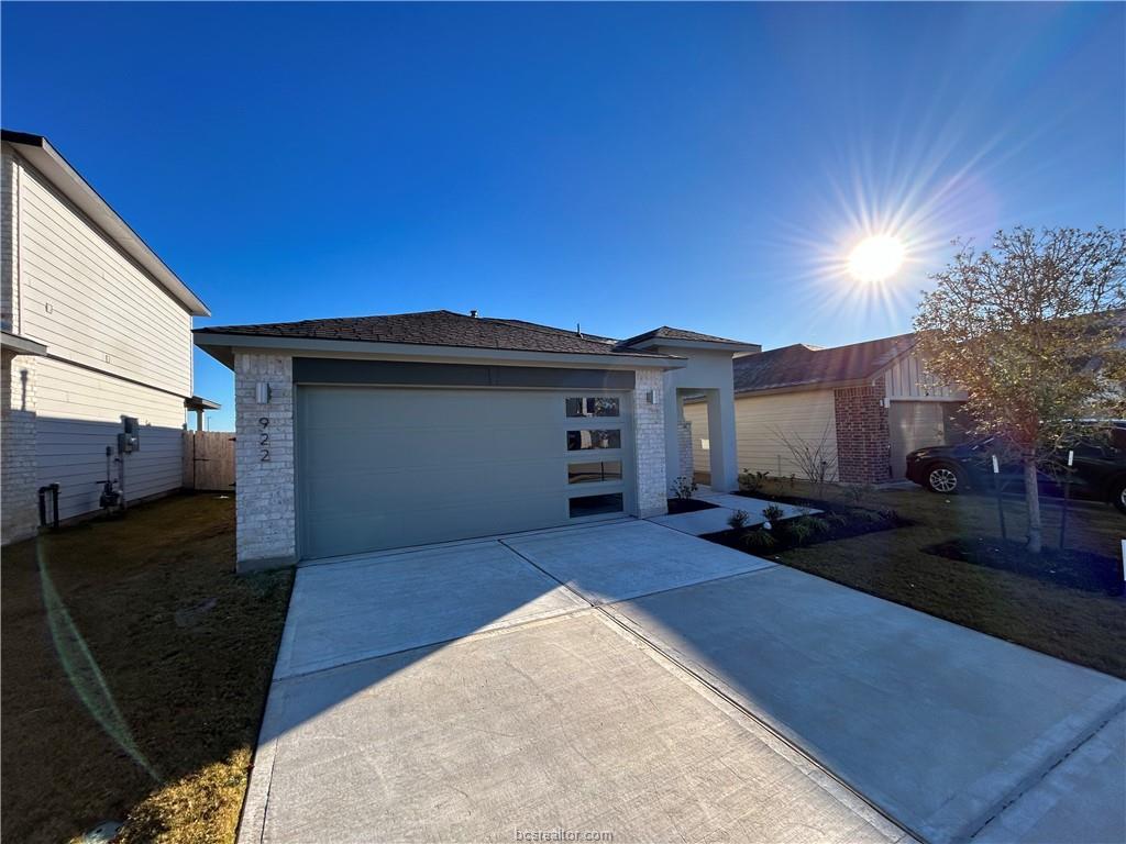 View of front of home with a garage