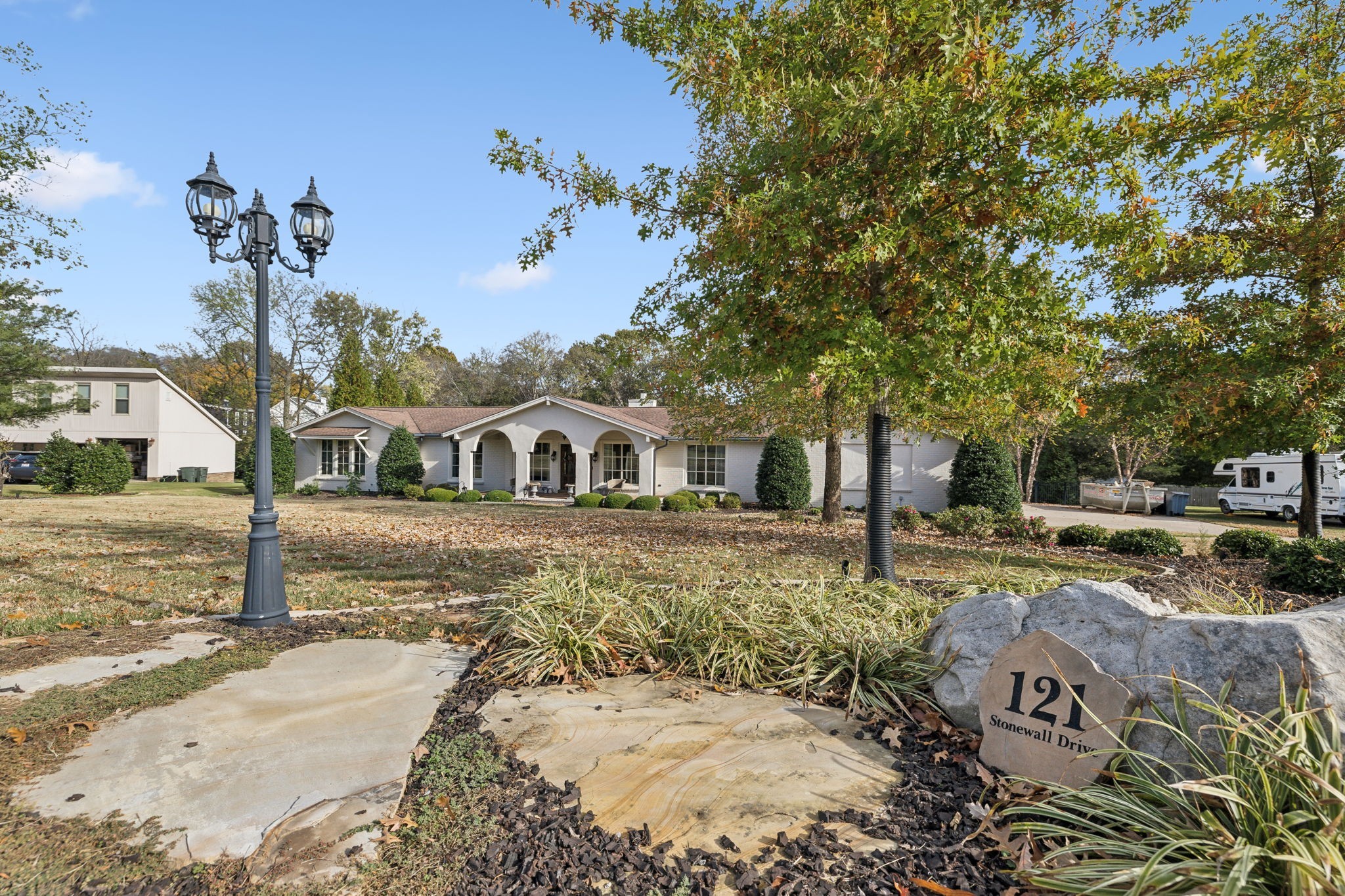 a front view of a house with a yard