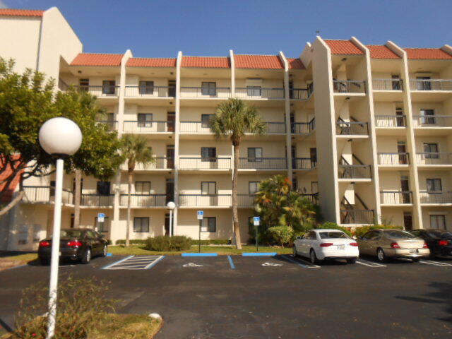 a front view of a building with street view