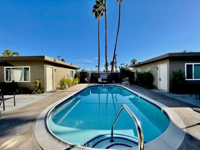 a view of a house with swimming pool