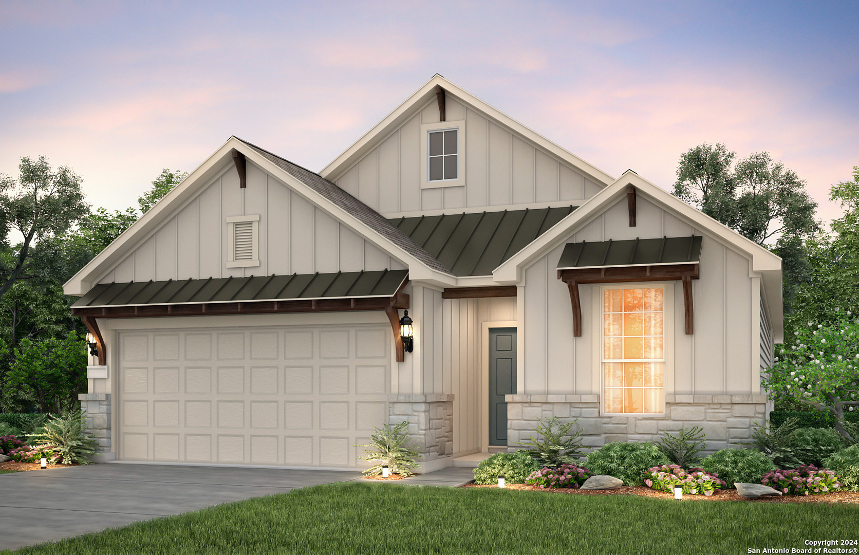 a front view of a house with a yard and garage